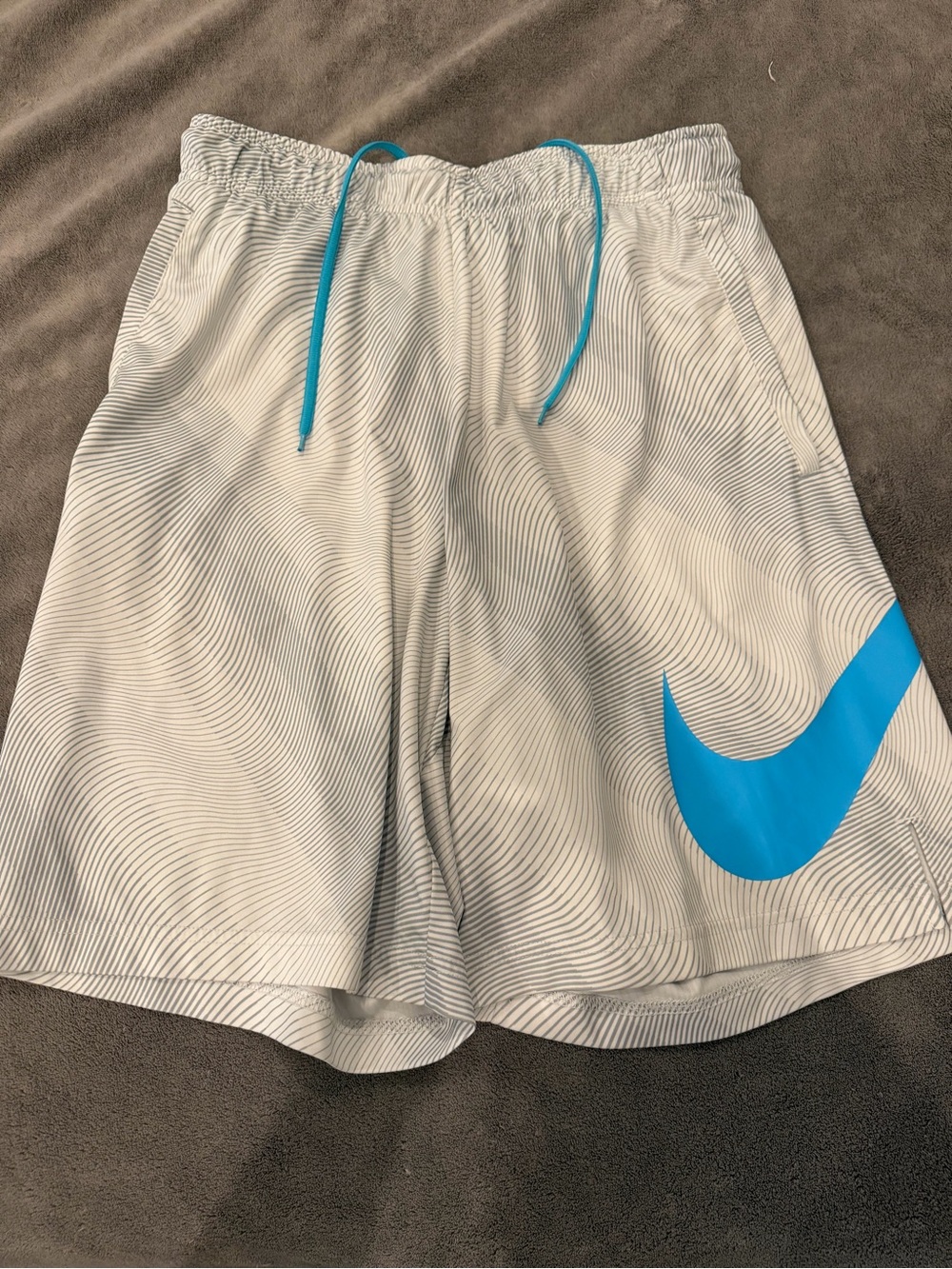 Nike White Athletic Shorts with Bright Blue Swoosh
